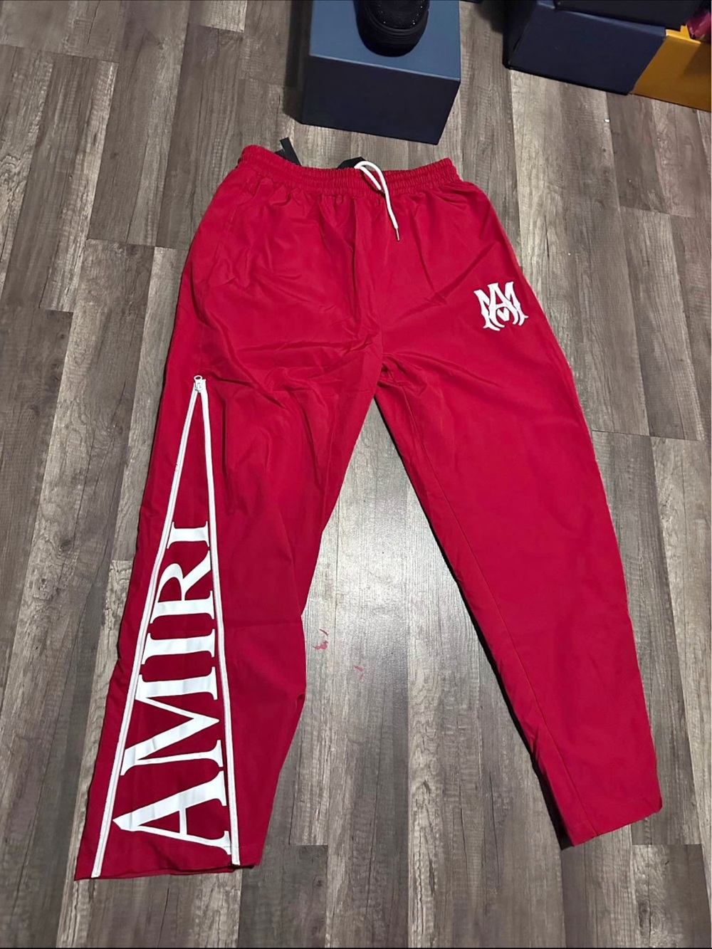 AMIRI Red wide leg Track pants with White Logo